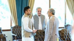 Special Assistant to the PM for Overseas Pakistanis & HRD Sayed Zulfiqar Bukhari talking to Foreign Minister Shah Mehmood Qureshi and Finance Minister.