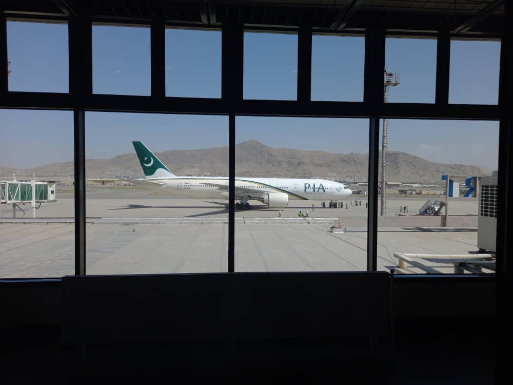 A PIA Boeing 777 operating a special charter flight at Kabul International Airport.