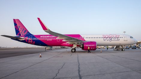 Wizz Air Abu Dhabi Airbus A321neo A6-WZB parked at Abu Dhabi airport apron.
